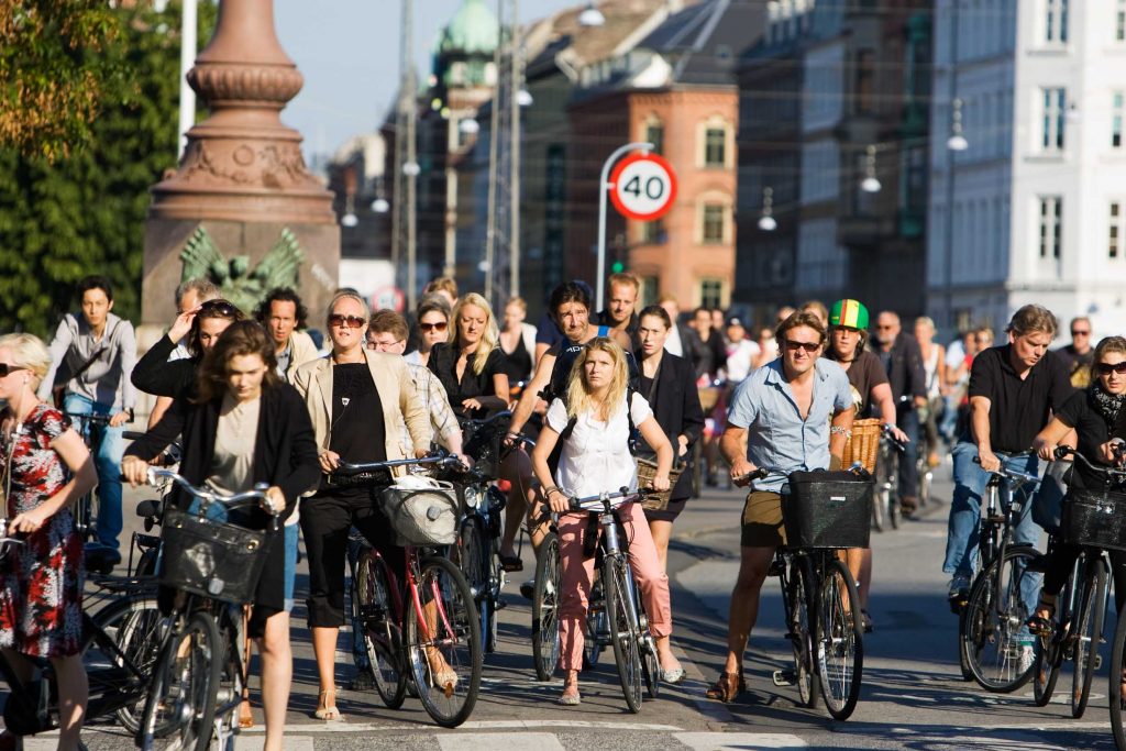 Life in Copenhagen is lived in the saddle of a bicycle. Everybody does it. Bike that is. In Copenhagen, we bike whether there is sun, rain or snow. We bike to work, to school, to bring the kids to kindergarten, to shop for groceries and to social gatherings. Cycling is fast, convenient, healthy, climate-friendly, enjoyable - and cheap, although Copenhageners honestly love their bikes no matter their financial income. Even top politicians ride their bike every day to parliament. For more information about the Copenhagen bike culture: http://www.visitcopenhagen.com/copenhagen/sightseeing/bike-city-copenhagen